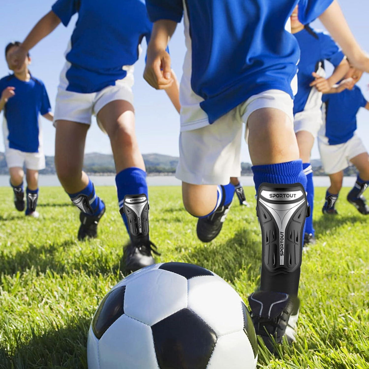 Sportout Fußball Schienbeinschoner Hartschale Knöchelriemen Kids Jugend