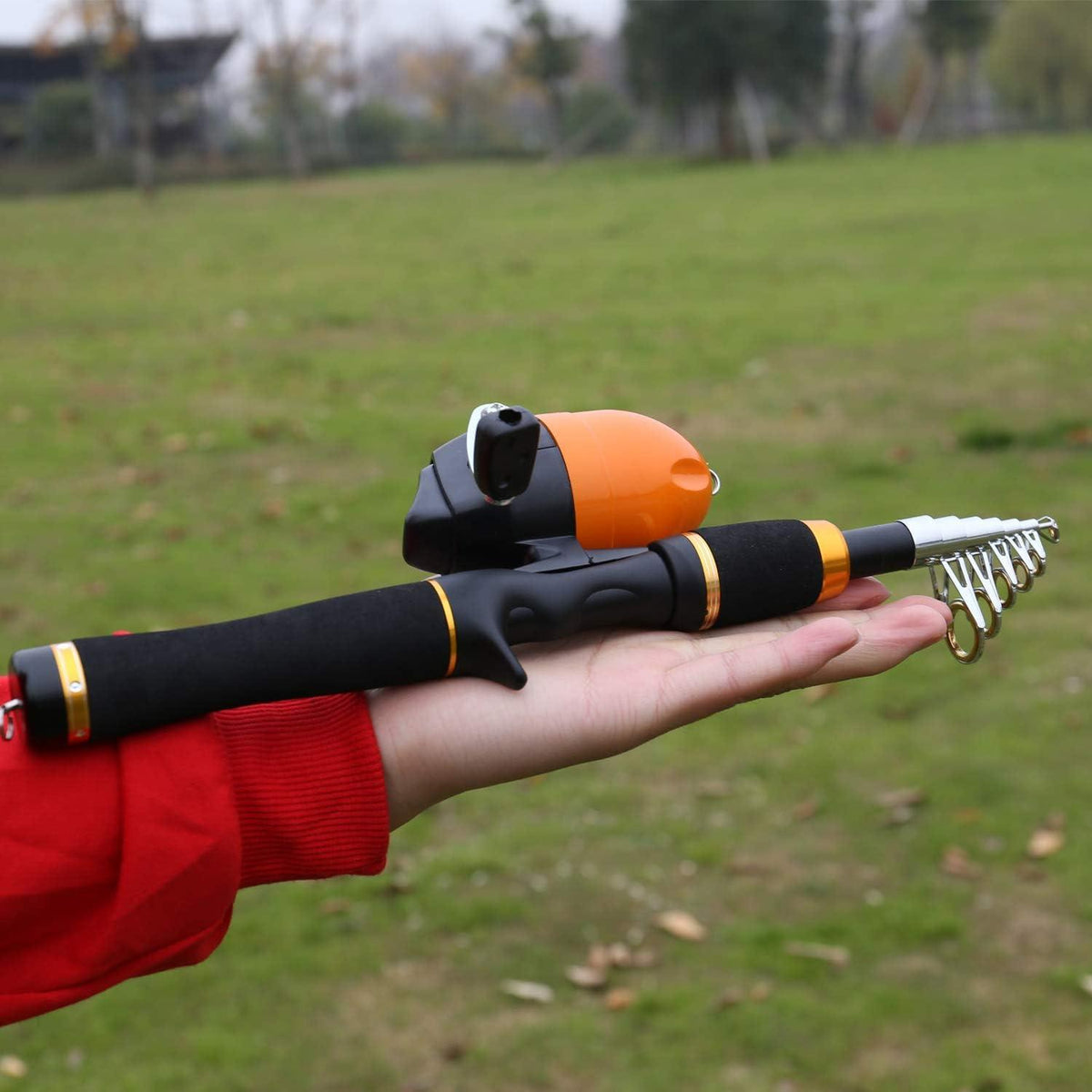 Angelrute Spincast Teleskop Combo für Kinder und Erwachsene - Orange